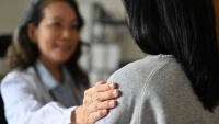 Doctor talking to patient